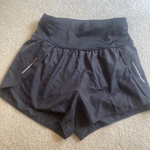 All In Motion High Rise Shorts black size small running pocket in back
